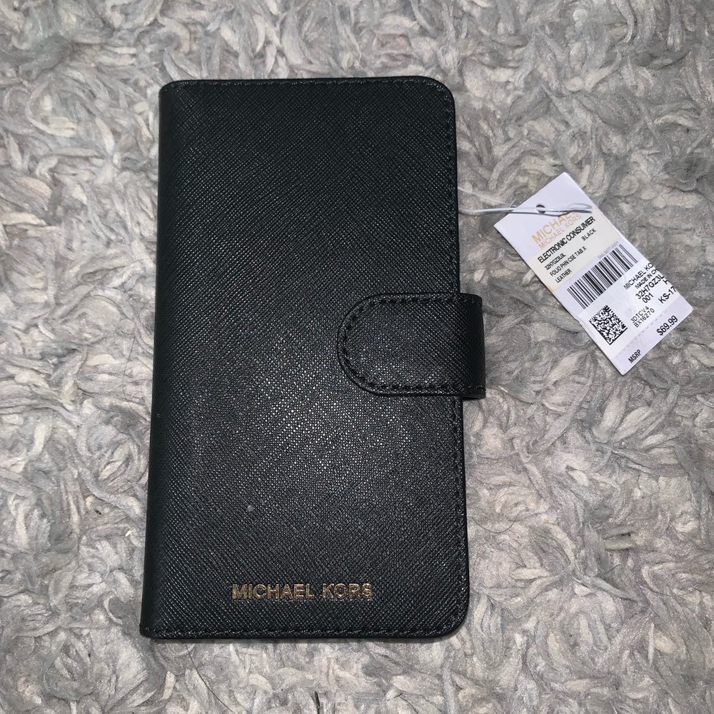 An iPhone XR Michael Kors case/wallet